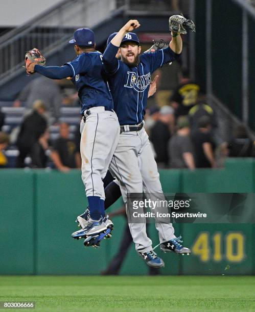 Tampa Bay Rays right fielder Steven Souza Jr. #20 celebrates with center fielder Mallex Smith and left fielder Corey Dickerson after the final out in...