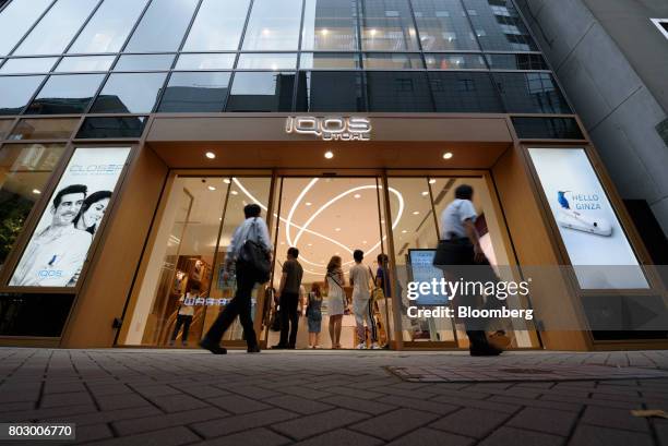 Philip Morris International Inc.'s IQOS Store Ginza stands in Tokyo, Japan, on Monday, June 26, 2017. By next week, smokeless devices by Japan...