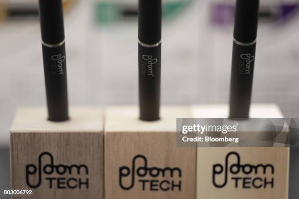 Japan Tobacco Inc.'s Ploom Tech smokeless tobacco devices sit on display during a media preview at the company's Ploom Shop Ginza in Tokyo, Japan, on...