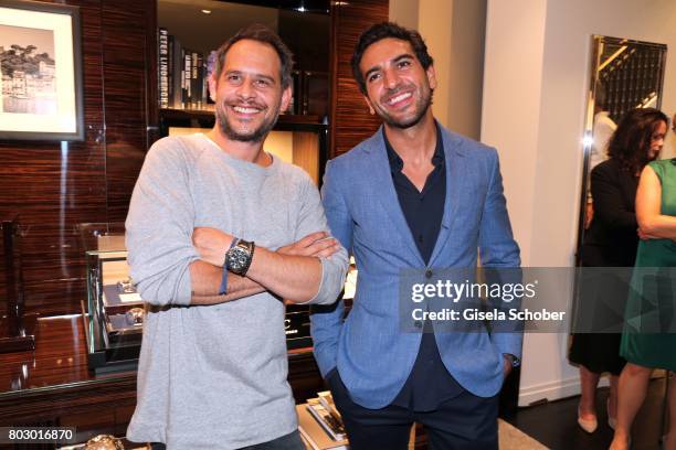 Moritz Bleibtreu and Elyas M'Barek attend the exclusive grand opening event of the new IWC Schaffhausen Boutique in Munich on June 28, 2017 in...