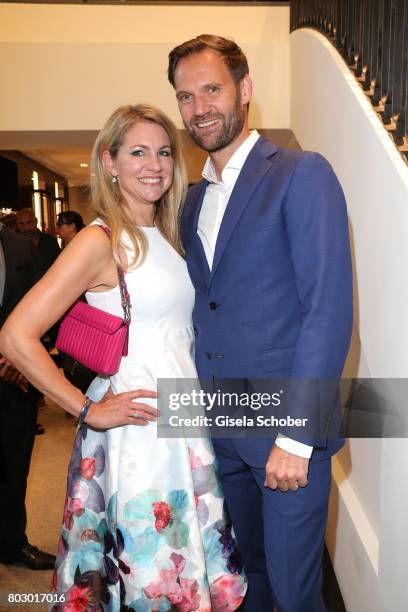 Nicole Blome and Marc Autmaring , director Wempe Weinstrasse Munich attend the exclusive grand opening event of the new IWC Schaffhausen Boutique in...