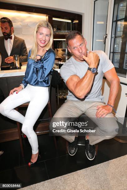 Ralf Moeller and his girlfriend Justine attend the exclusive grand opening event of the new IWC Schaffhausen Boutique in Munich on June 28, 2017 in...