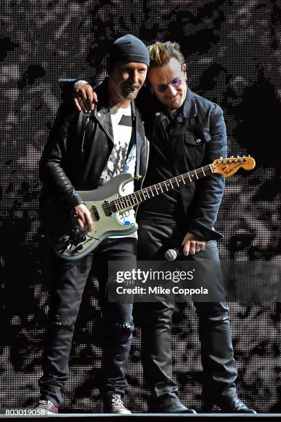 Guitar player The Edge, and Singer Bono of the band U2 perform during U2 "Joshua Tree Tour 2017" at MetLife Stadium on June 28, 2017 in East...