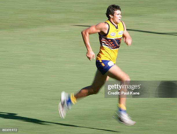 Josh Kennedy of the Eagles trains away from the main group during a West Coast Eagles AFL training session at Subiaco Oval on March 19, 2008 in...