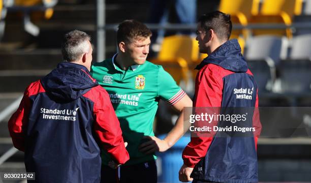 Rob Howley, the Lions backs coach talks to Owen Farrell and Jonathan Sexton during the British & Irish Lions training session at Porirua Park on June...