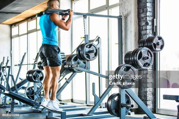 calf raises exercise. - calf stock pictures, royalty-free photos & images