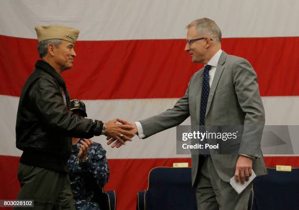 Navy Admiral Harry Harris , Commander of the U.S. Pacific Command shakes hands with Australian Minister for Urban Infrastructure Paul Fletcher during...