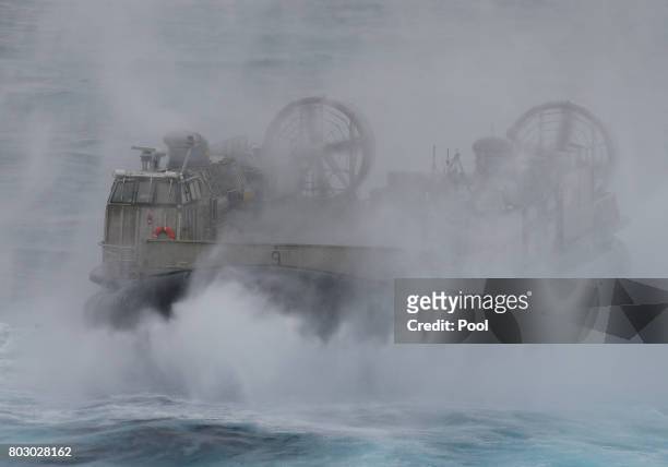 Navy Landing Craft Air Cushion heads across the Pacific Ocean towards Sydney, Australia, July 29, 2017 during events marking the start of Talisman...