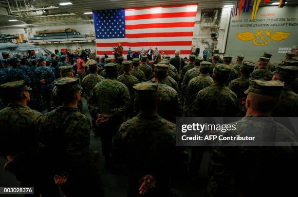 Navy Admiral Harry Harris, Commander of the U.S. Pacific Command, speaks in front of US Marines at a ceremony marking the start of Talisman Saber...