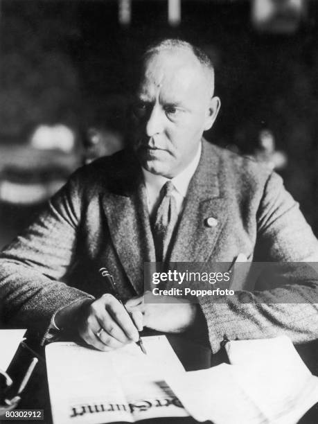 German Nazi Party politician Gregor Strasser , with a copy of the party's newspaper 'Der Sturmer' circa 1930. Strasser was assassinated by the...