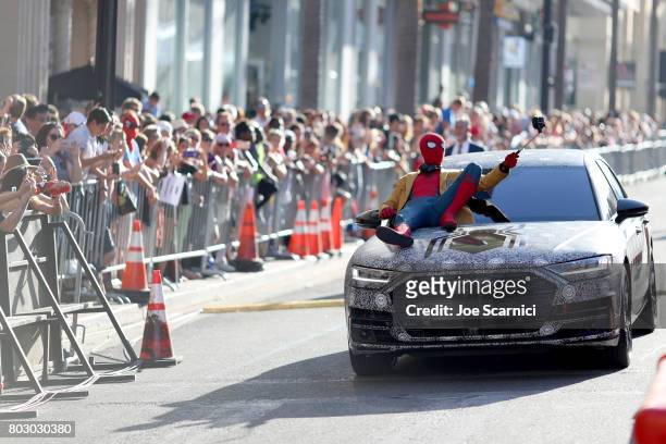 Actor dressed as Spider-Man attends the World Premiere of 'Spider-Man: Homecoming' hosted by Audi at TCL Chinese Theatre on June 28, 2017 in...