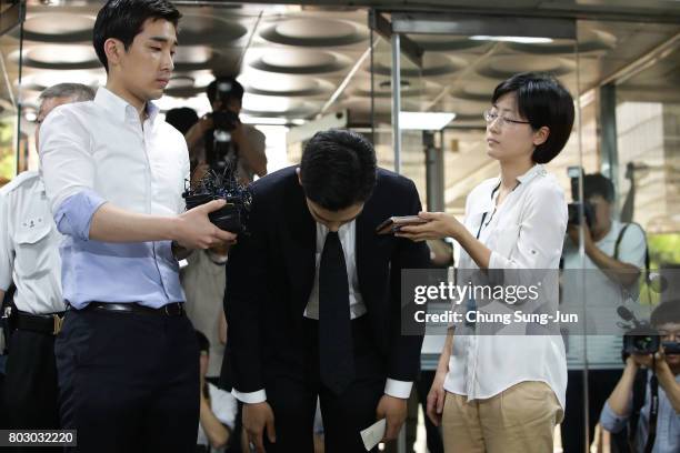 Of South Korean boyband Big Bang arrives at the Seoul Central District Court for hearing on his marijuana usage case on June 29, 2017 in Seoul, South...