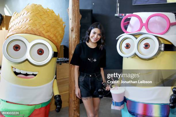 Minions tourist Dave and Jerry with Miranda Cosgrove at the Puma x Minions Collaboration Launch at BAIT on June 28, 2017 in Los Angeles, California.