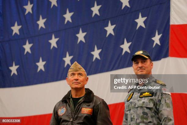 Navy Admiral Harry Harris , Commander of the US Pacific Command and Australian Navy Vice Admiral David Johnston take part in a ceremony marking the...