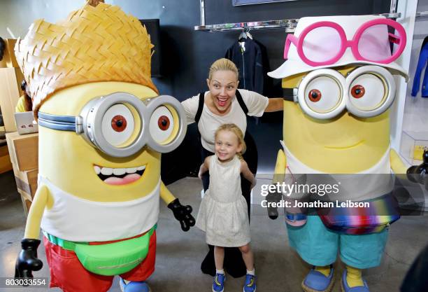 Minions tourist Dave and Jerry with Tara Swennen at the Puma x Minions Collaboration Launch at BAIT on June 28, 2017 in Los Angeles, California.