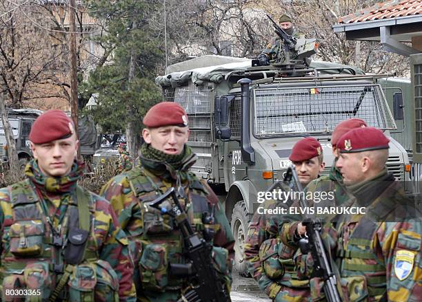 Belgian soldiers, members of NATO mission in Kosovo, secure perimeter around Municipal Court in Northern Mitrovica, on 19 March, 2008. UN police were...