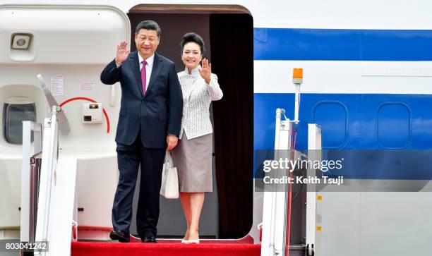 Chinese President Xi Jinping and first lady Peng Liyuan arrive at Hong Kong International Airport on June 29, 2017 in Hong Kong. Chinese President Xi...