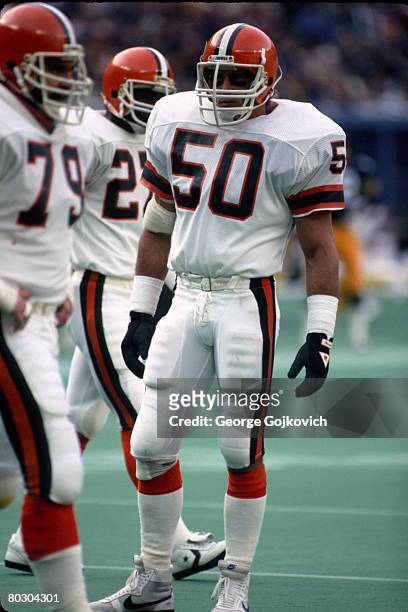 Linebacker Tom Cousineau of the Cleveland Browns looks on from the field during a game against the Pittsburgh Steelers at Three Rivers Stadium on...