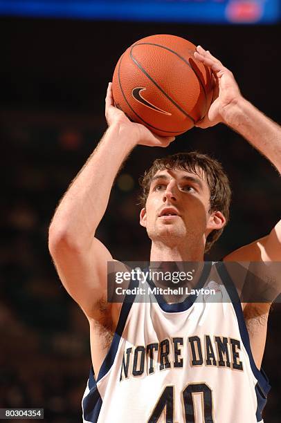 Luke Zeller of the Notre Dame Fighting Irish takes a foul shot against the Marquette Golden Eagles during the quarterfinals of the Big East...