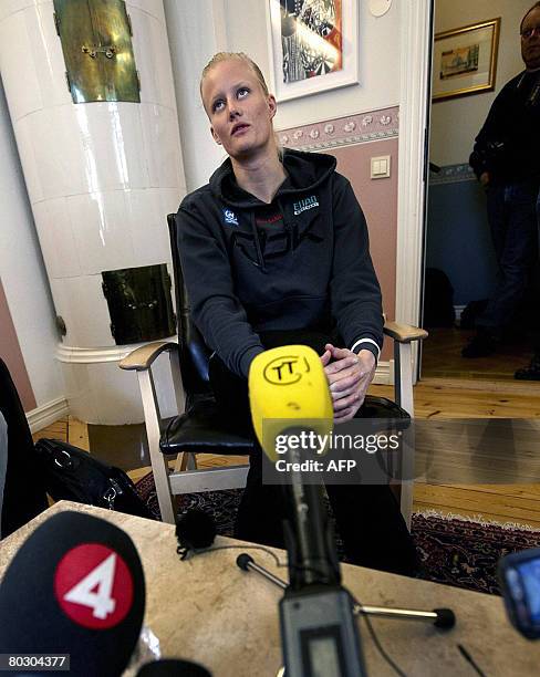 Olympic heptathlon champion Carolina Kluft of Sweden announces during a press conference in Vaxjo on March 19, 2008 that she will not defend her...