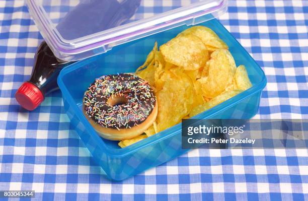 unhealthy lunch box on table cloth - sack lunch stock pictures, royalty-free photos & images