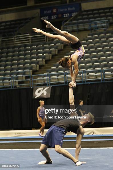 Acrobats Routine Athletes practice their acrobat routines during practice time at the ...