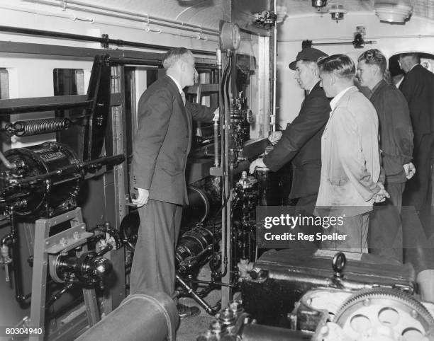 Class in progress in the brake chamber of a British Railways instructional train at Waterloo Station, 5th October 1956. Instructor F. T. Littlefield...