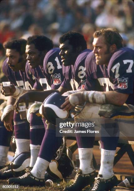 The Minnesota Vikings defenisve line known as the Purple People Eaters including: Alan Page, Jim Marshall, Gary Larsen, and Carl Eller sit the bench.