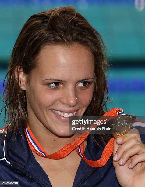 Laure Manaudou of France poses with her gold medal after winning the Women's 200m Backstroke during day seven of the 29th LEN European Championships...