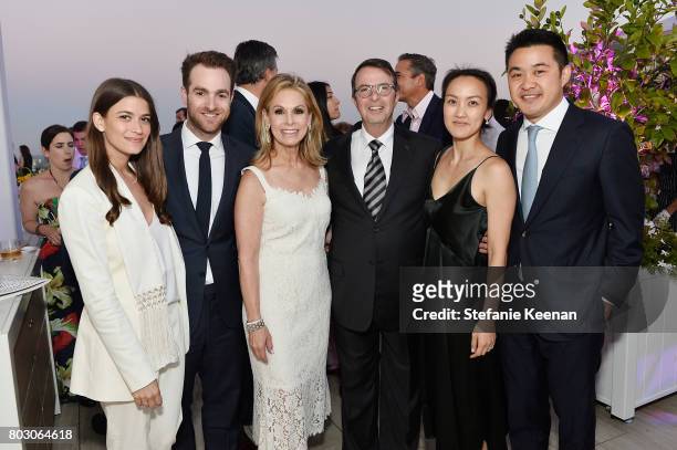 Amanda Alagem, David Alagem, Adele Alagem, Beny Alagem, Janice Wang and Eddie Wang attend Waldorf Astoria Beverly Hills Grand Opening Cocktail...