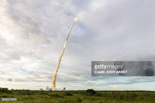 An Ariane 5 rocket lifts off on June 28, 2017 from the French Guiana Space Center in Kourou with HS3-IS satellite and India's latest communication...