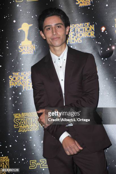 Lorenzo James Henrie poses in the press room at the 43rd Annual Saturn Awards at The Castaway on June 28, 2017 in Burbank, California.