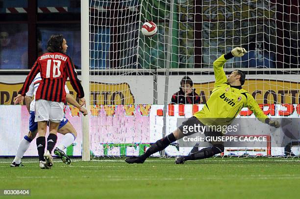 Sampdoria's defender Christian Maggio kicks and score while AC MIlan's Australian goalkeeper Kalac Zeljko try to save it during their "Serie A"...