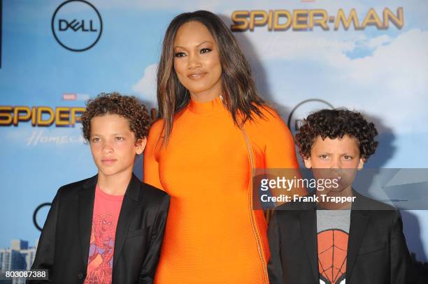 Actress Garcelle Beauvias, Jax Joseph Nilon and Jaid Thomas Nilon attend the premiere of Columbia Pictures' "Spider-Man: Homecoming" held at TCL...