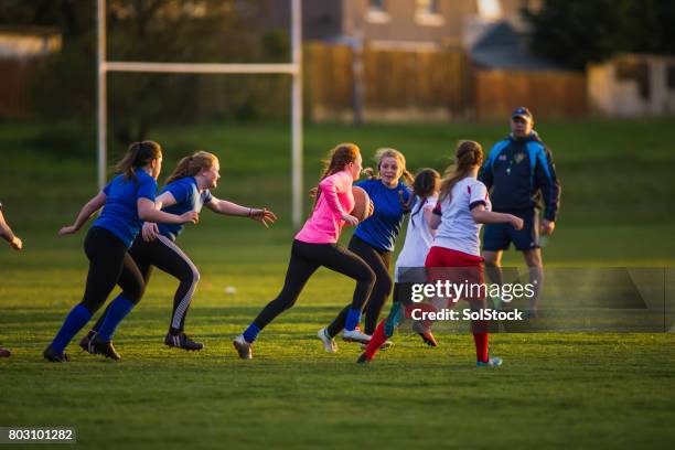 teen girls playing a game of rugby - angry coach stock pictures, royalty-free photos & images