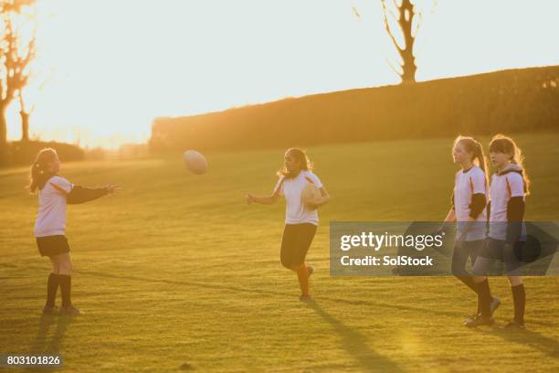 teen girls playing a game of rugby - angry rugby player stock pictures, royalty-free photos & images