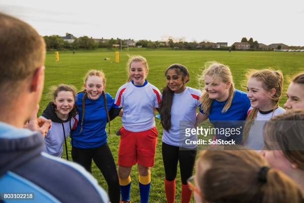 Rugby Girls Team Huddle