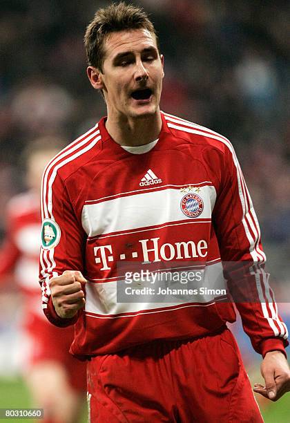 Miroslav Klose of Bayern Munich celebrates after scoring 2-0 during the DFB Cup Semi Final match between FC Bayern Munich and VfL Wolfsurg at the...