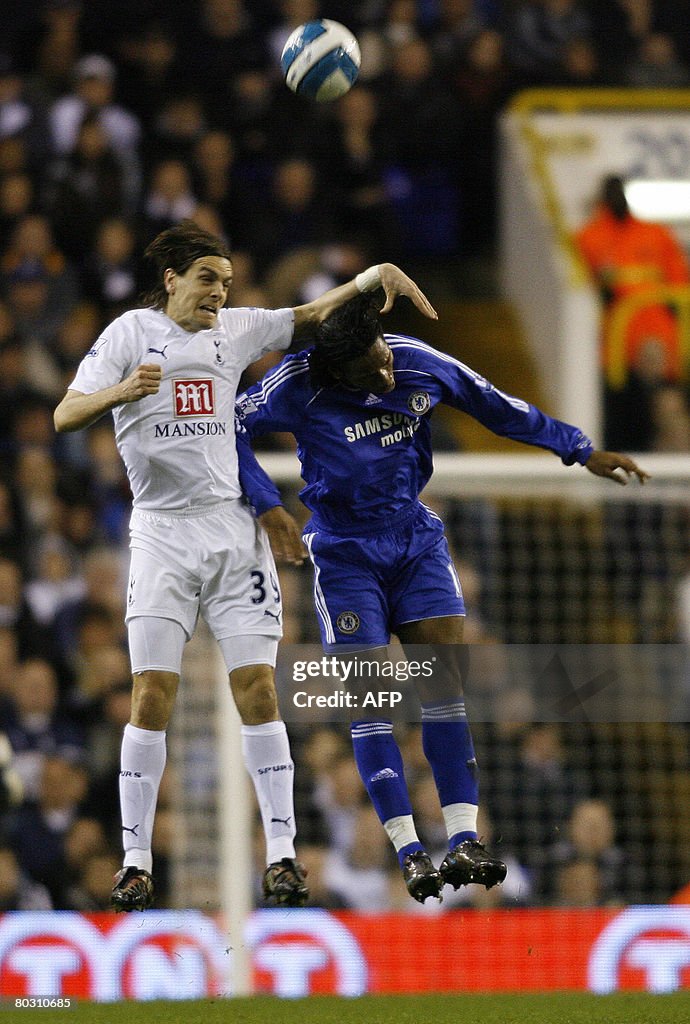 Chelsea's Ivory Coast Striker Didier Drogba vies with Tottenham's