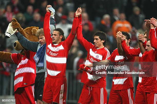 Players of Munich celebrate victory after winning the DFB Cup semi final match between Bayern Munich and VfL Wolfsburg at the Allianz Arena on March...