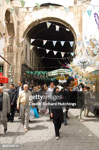 Shoppers exit the Souk. Shoppers exit the Souk.