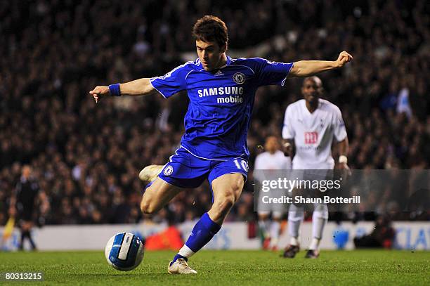 Joe Cole of Chelsea shoots and scores his team's fourth goal of the Barclays Premier League match between Tottenham Hotspur and Chelsea at White Hart...