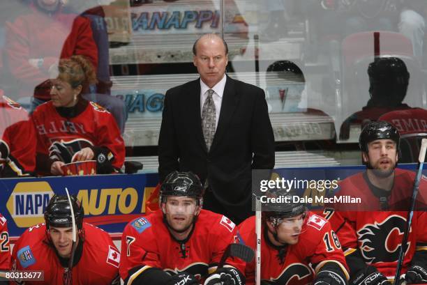 March 7: Head Coach Mike Keenan of the Calgary Flames looks on from the bench during the NHL game against the Nashville Predators at the Pengrowth...