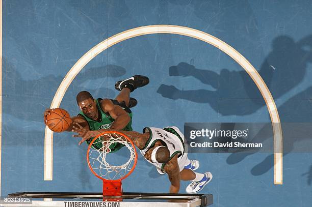 Leon Powe of the Boston Celtics takes the ball to the basket against Rashad McCants of the Minnesota Timberwolves during the game on February 8, 2008...