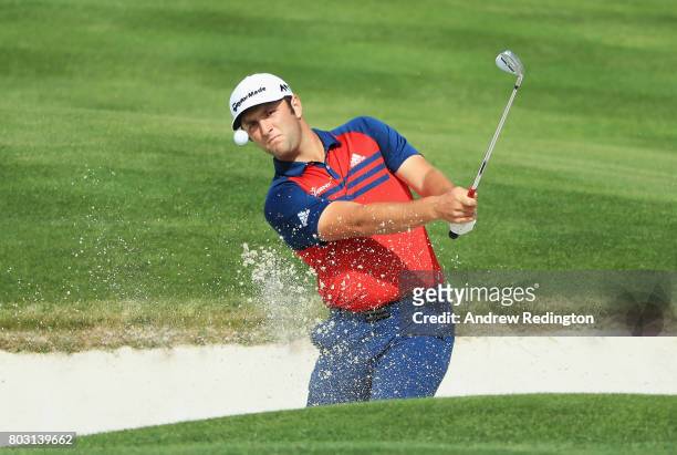 Jon Rahm of Spain plays from a bunker on the 18th hole during day one of the HNA Open de France at Le Golf National on June 29, 2017 in Paris, France.