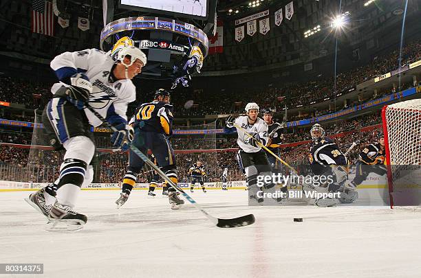 Vincent Lecavalier and Martin St. Louis of the Tampa Bay Lightning skate in against Ryan Miller of the Buffalo Sabres on March 19, 2008 at HSBC Arena...