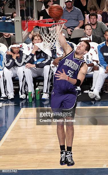 Brad Miller of the Sacramento Kings goes up for the shot during the NBA game against the Dallas Mavericks at the American Airlines Center on February...