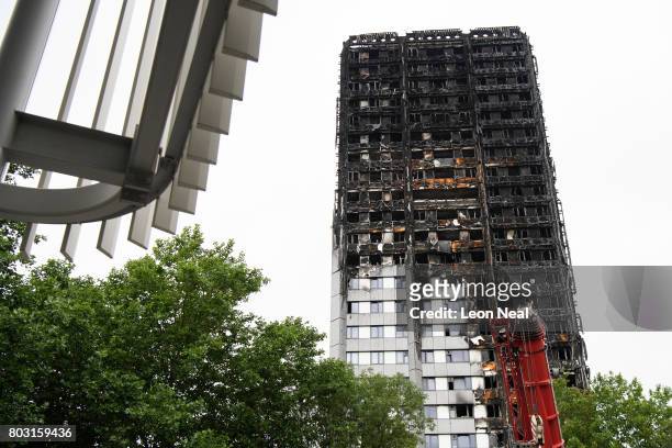 The remains of Grenfell Tower are seen on the day of the funeral of one of the victims of the fire, on June 29, 2017 in London, England. Tony Disson...