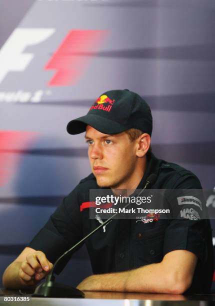 Sebastian Vettel of Germany and Scuderia Toro Rosso attends the drivers press conference during previews for the Malaysian Formula One Grand Prix at...