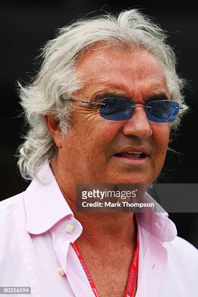 Chairman and Renault F1 Team Principal Flavio Briatore is seen in the paddock during previews for the Malaysian Formula One Grand Prix at the Sepang...